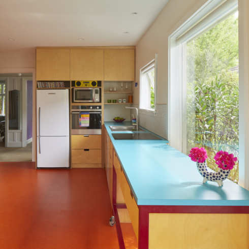 Bright and colourful kitchen renovation for an artistic couple and their young family